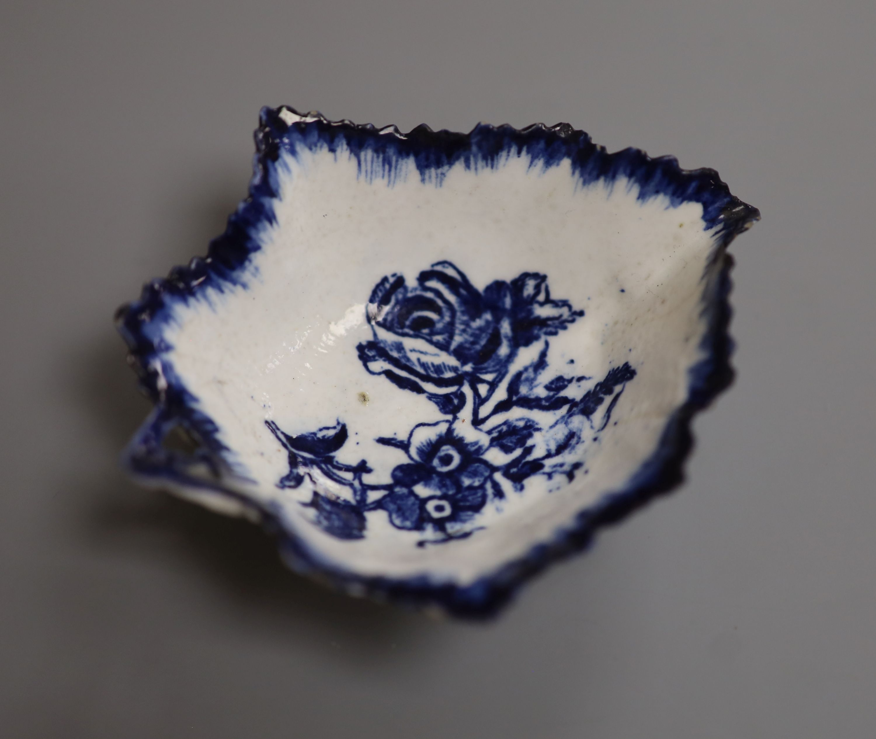 A Derby leaf shaped pickle dish printed with roses, under a painted border ex. Gilbert Bradley Col., green GB mark, length 9.5cm